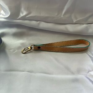 Dooney & Bourke Tan and Teal Leather Wrist Strap